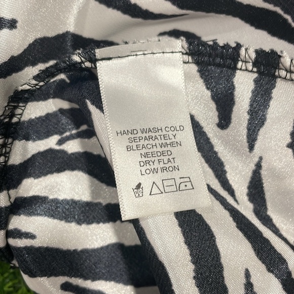 Sleeveless satin zebra striped blouse with rhinestone empire waist detail. - Picture 5 of 5